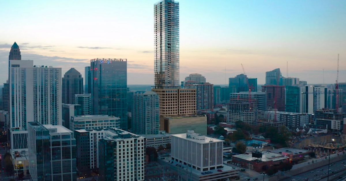 Construction fencing moves in for Atlanta's tallest building in ages